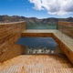 Illustration for article titled This High-Altitude Overlook Perfectly Frames a Volcano